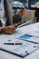 Office, tablet and business man happy for positive financial savings, finance budget report or administration feedback. Growth analytics, data analysis review and person smile for research statistics photo