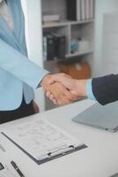 Close up view of job interview in office, focus on resume writing tips, employer reviewing good cv of prepared skilled applicant, recruiter considering application, hr manager making hiring decision photo
