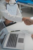 Close up view of job interview in office, focus on resume writing tips, employer reviewing good cv of prepared skilled applicant, recruiter considering application, hr manager making hiring decision photo