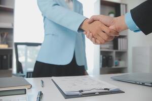 Close up view of job interview in office, focus on resume writing tips, employer reviewing good cv of prepared skilled applicant, recruiter considering application, hr manager making hiring decision photo
