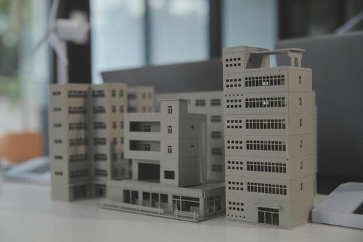 Close-up at tablet, Engineers pointing at tablet with their hands. To jointly design the use of renewable energy with wind and solar energy. Concept of using renewable energy. photo