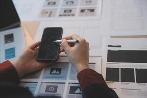 UX UI design process for modish mobile application and website . Creative prototype of wireframe for professional app developer . photo