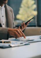 Office, tablet and business man happy for positive financial savings, finance budget report or administration feedback. Growth analytics, data analysis review and person smile for research statistics photo