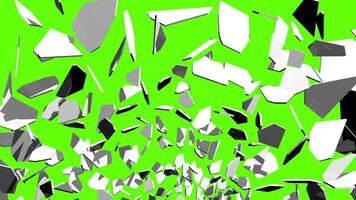 Weiß farbig Mauer explodiert in klein Stücke gegen Grün Hintergrund. 3d Animation video