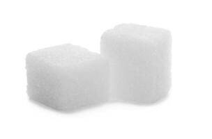 Sugar cubes on white photo
