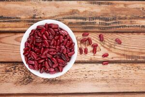 Red beans on wooden photo