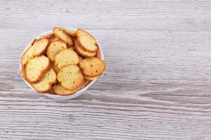 Wheat crackers on wood photo