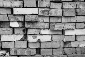 Beautiful texture old brick from big wall block, natural structure close up photo