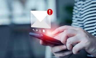 Electronic mail concept. man presses on his smartphone to check electronic mail. Internet messages and online communication, technology, networks photo