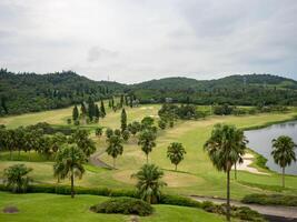 Golf course with gorgeous green and pond in Taiwan. photo