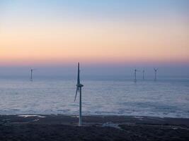 Offshore Wind Turbines Farm in Taiwan. photo