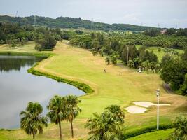 Golf course with gorgeous green and pond in Taiwan. photo