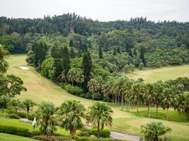 Golf course with gorgeous green and pond in Taiwan. photo