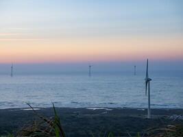 Offshore Wind Turbines Farm in Taiwan. photo