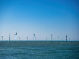 Offshore Wind Turbines Farm in Taiwan. photo