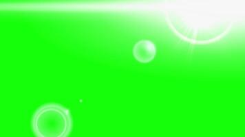 glowing lens flare effect with green chroma key background overlay video