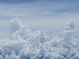 Aerial view of sky seen through the airplane window. Space for text photo