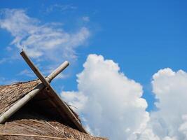 Hut roof in the beautiful blue sky background photo