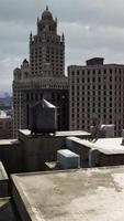 view of the towering buildings and rooftops in the cityscape of Manhattan. video