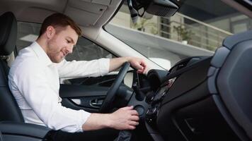 Businessman examine vehicle before making purchase. Buy car video