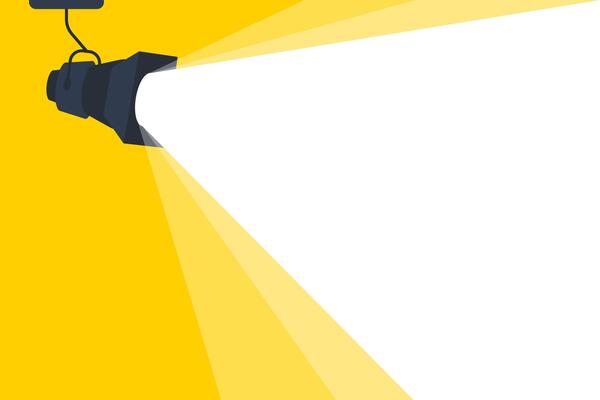 Retro spotlight is glowing on wall. Vector illustration