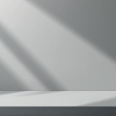 Empty studio room background with light shadow on wall.
