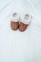 Warm home shoes on clean Background photo