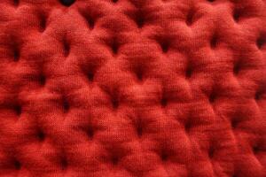 Close-up luxury red leather cushion. sofa retro. upholstery photo