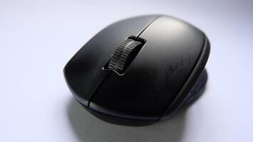 Computer mouse on white background. Close-up. Selective focus. photo