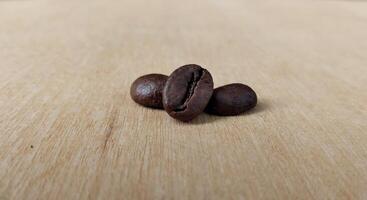 Coffee beans background. Close up of roasted coffee beans. photo