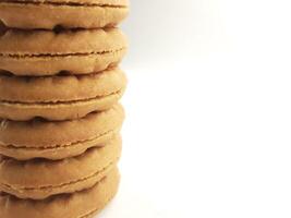 cookies with strawberry jam on a white background, close up photo