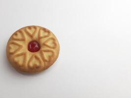 cookies with strawberry jam on a white background, close up photo