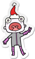 hand drawn sticker cartoon of a weird alien waving wearing santa hat png