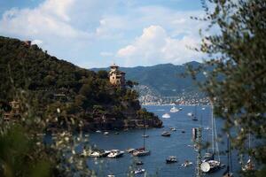 streets, bays and yachts on the charming coast of Portofino in northern Italy on a summer day photo