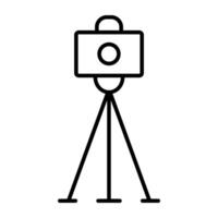 Cam on stand, tripod camera icon vector