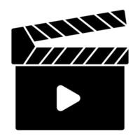 A solid design icon of clapperboard vector