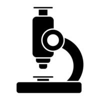 A lab research tool icon, solid design of microscope vector