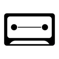 Audio cassette icon in solid design vector