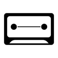 Audio cassette icon in solid design vector