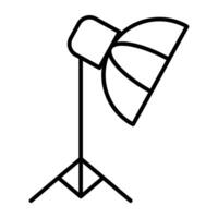 A linear design icon of studio light vector