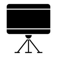 A tripod stand icon, solid design of presentation board vector
