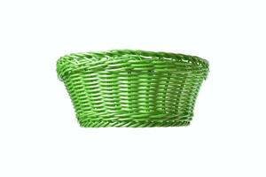 Macro photography of empty green plastic basket isolated on white background photo