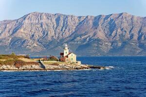 Lighthouse in Hvar Island in Croatia. photo