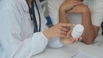 close up doctor, Asian doctor talk with old female patient about disease symptom, doctor use stethoscope listening lung of patient, elderly health check up, happiness hospital video