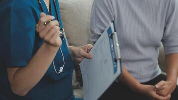 close up doctor, Asian doctor talk with old female patient about disease symptom, doctor use stethoscope listening lung of patient, elderly health check up, happiness hospital video