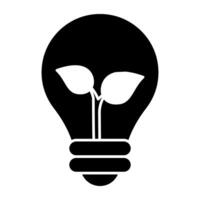 Leaves inside light bulb, concept of eco idea vector