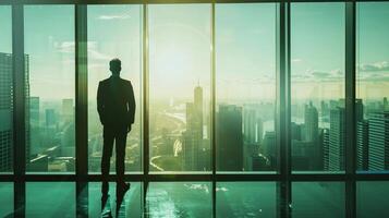 AI generated AI Generated businessman standing in office in front of a floor-to-ceiling glass window. photo