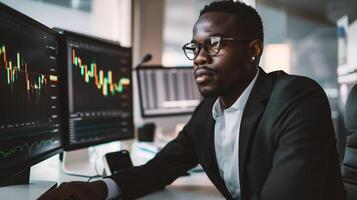 ai generado africano americano comerciante mirando a monitor con valores mercado datos en oficina foto