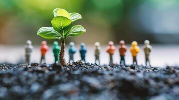 AI generated Miniature people with green seedling growing in soil, Ecology concept photo