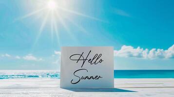 AI generated Hello summer text on white paper card over blue sky and sea background photo